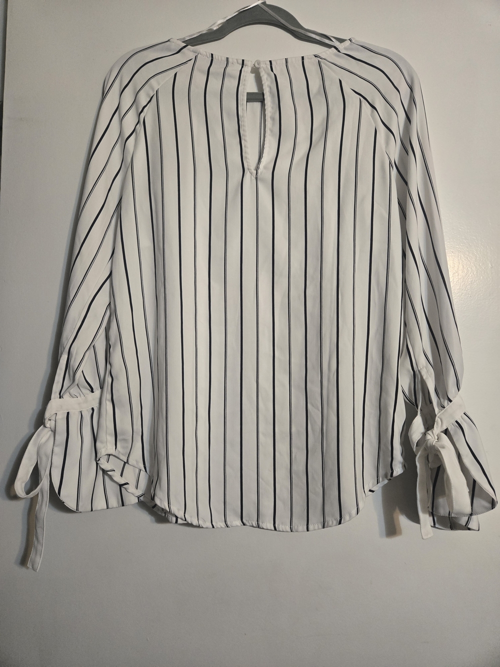 Dalia | White Blouse with Black Pinstripes and Ruffle Tie Cuffs